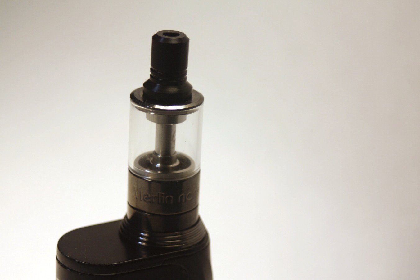 the Augvape Merlin Nano MTL RTA with the 2ml straight glass and the 22mm beauty ring