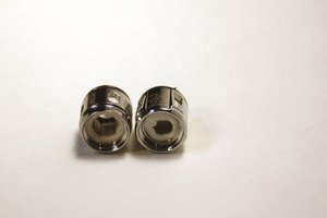 Wotofo Flow Pro vs Smok Baby Beast Mesh Coil wotofo flow pro mesh coil next to Smok Baby Beast mesh subohm coil