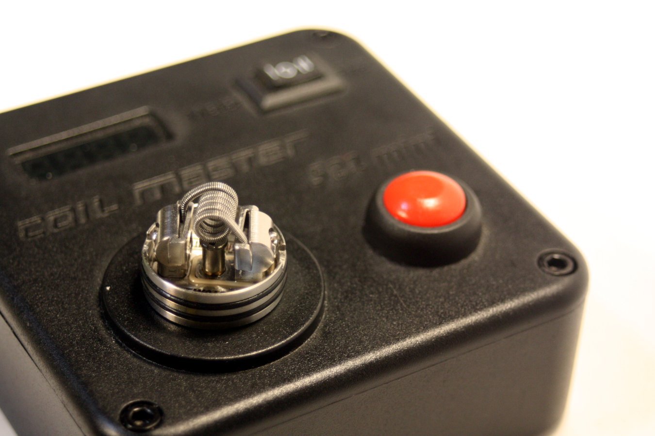 the wotofo profile RDA with a single coil stapled flat clapton installed in clamp style build deck