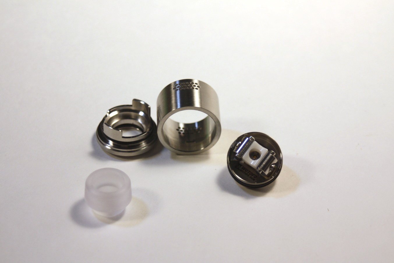 a view of the wotofo profile rda after it has been disassemble to various sections