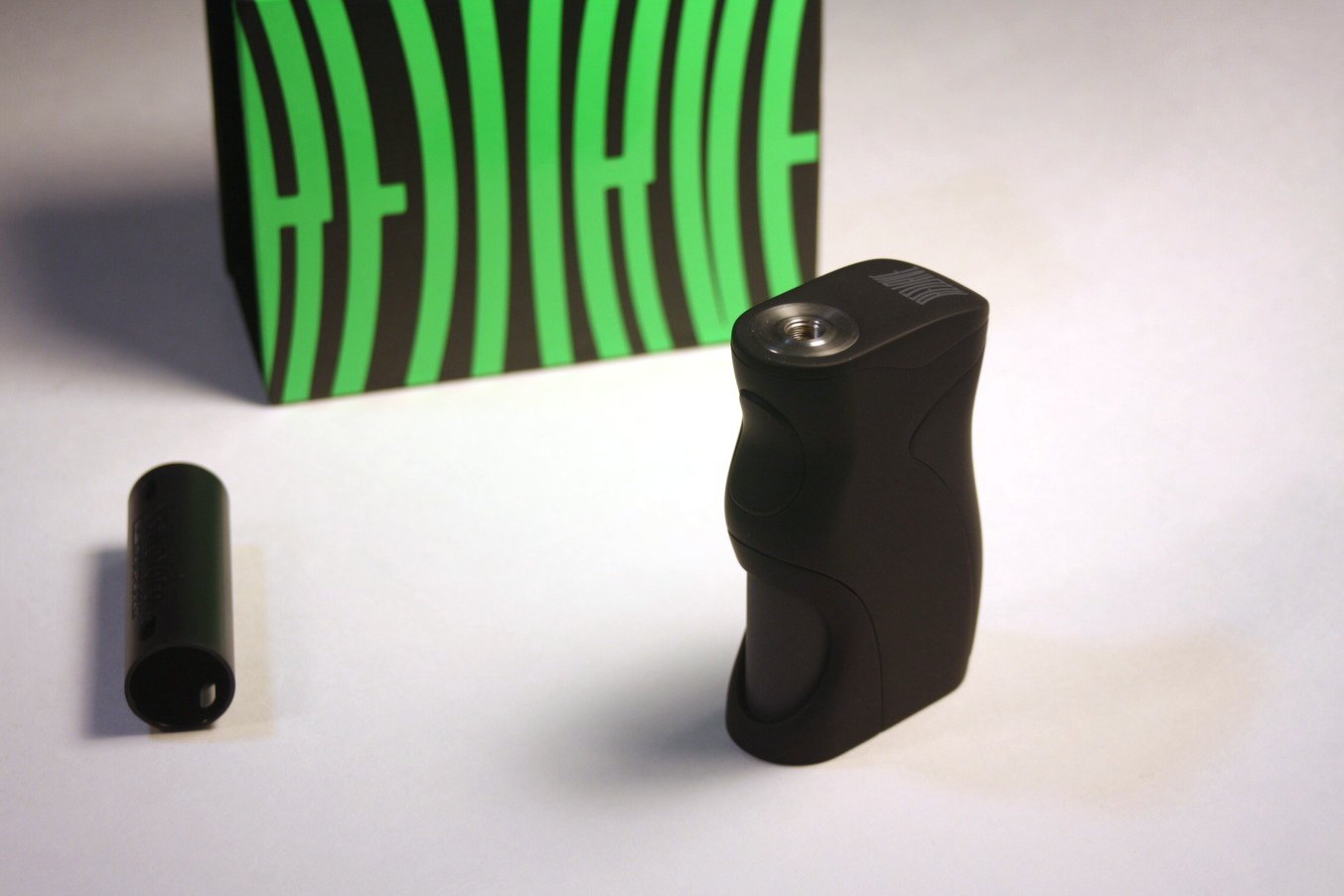 a front view of the wotofo recurve squonk box mod and battery adapter