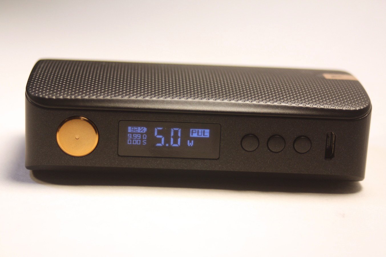 a Black colored Vaporesso Gen 200W vape box mod with large gold colored button